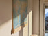 World Map Canvas with Wooden Hangers – Blue & Multicolor