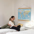 World Map Canvas with Wooden Hangers – Blue & Multicolor